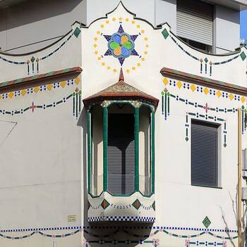 Cladding with balcony on house