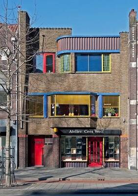 Modernist brick facade with vibrant color accents