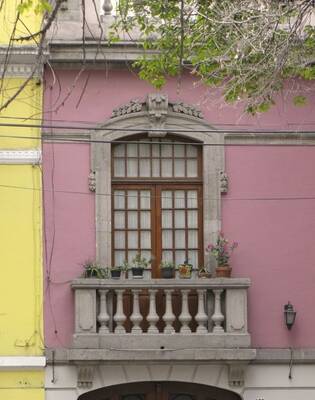 Cladding with balcony on facde