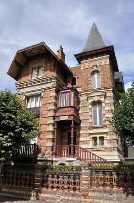 Eclectic 19th Century Brick Mansion with Neo-Gothic Tower and Polychrome Facade