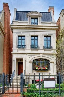 Elegant Neoclassical Facade of an Urban Mansion with Mansard Roof