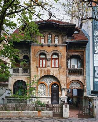 Elegant Neo-Romanesque Mansion with Richly Decorated Facade