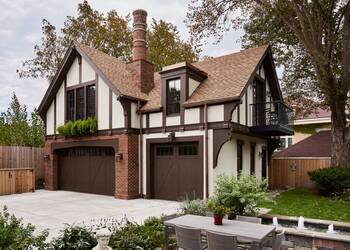 Elegant Neo-Tudor Facade with Contrasting Half-Timbered Detailing