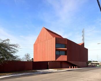 Monolithic Terracotta Facade: Minimalism and Expressive Geometry