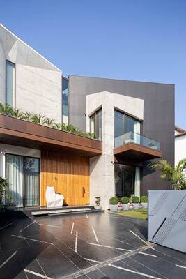 Modern facade with contrasting materials and cantilevered design