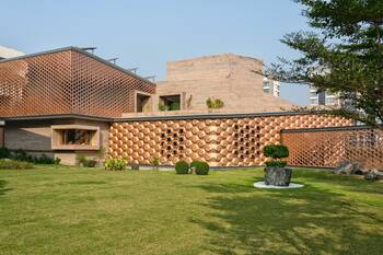 Modern house with textured perforated facade