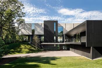 Contrasting Facade of Modern Mansion with Cantilevered Elements