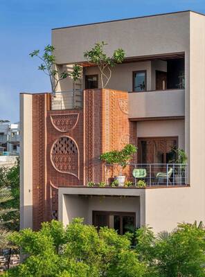 Modern façade with Eastern motifs: combination of brick decor and minimalist forms