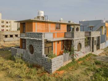 Photo of house with orange parts