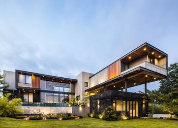 Dynamic facade of a modern mansion with cantilever elements