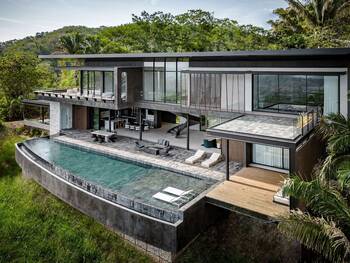 Modern Tropical Residence with Multi-Level Facade and Infinity Pool