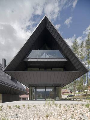 Avant-garde Triangular Facade: Modern Geometry in Mountain Context