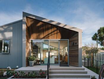 Modern house with contrasting facade and asymmetrical roof