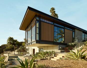 Modern Facade with Wooden Slats: Minimalism in a Tropical Landscape