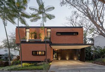 Modern Brick Facade: Minimalism in a Tropical Setting