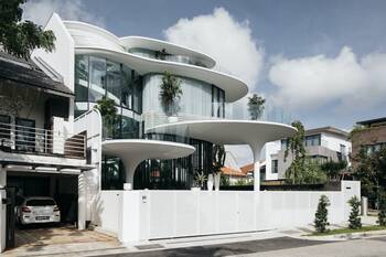 Modern villa with a futuristic multi-level facade