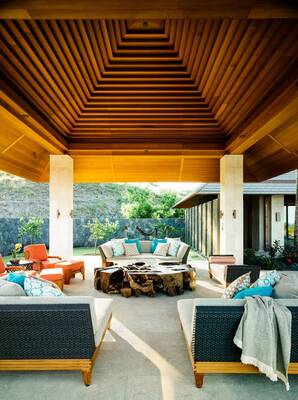 Modern tropical terrace with pyramidal wooden ceiling and open facade