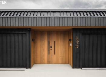 Cladding with doors on facde