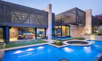 Modern House with Perforated Facade and Swimming Pool