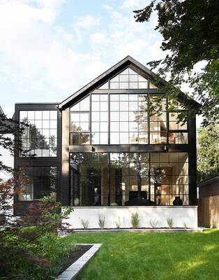 Modern House with Panoramic Glass Facade in Industrial Style