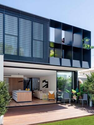 Contrasting facade with dynamic cubic structure and integrated greenery