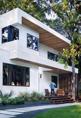 Modern Minimalist Facade with Contrasting Wooden Elements