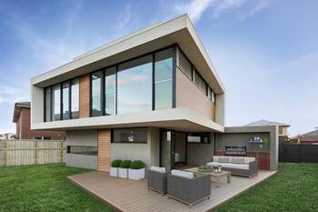 Contemporary minimalist house with contrasting façade and floating second floor