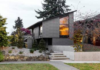 Modern Minimalist Facade with Contrasting Cladding and Panoramic Glazing