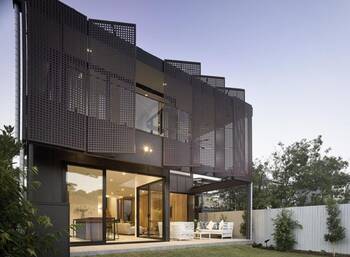 Dynamic Perforated Facade: Balancing Privacy and Light in a Contemporary Home