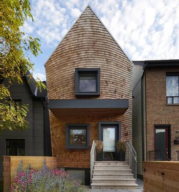 Modern Narrow House with Triangular Wooden Facade