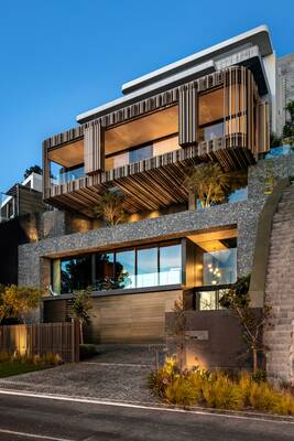 Modern Cascading House with Dynamic Wooden Façade