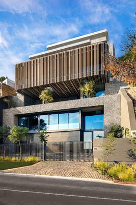 Modern House with Wooden Louver Facade