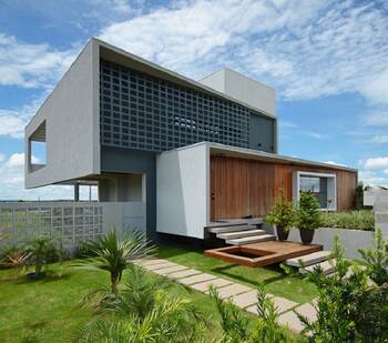 Modern minimalist house with combined concrete and wood facade