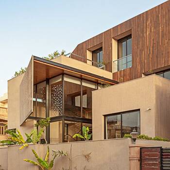 Modern house with contrasting wooden and concrete facade