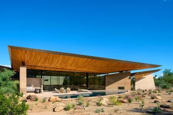 Desert Oasis: Floating Wooden Facade with Dynamic Roof