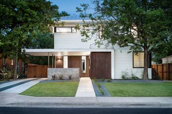 Modern Minimalist Facade with Contrasting Wooden Elements