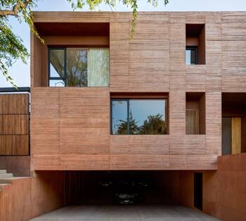 Cladding with windows on house
