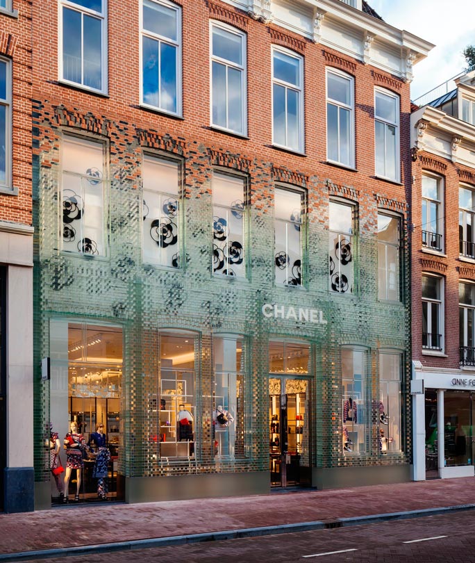 MVRDV replaces traditional facade with glass bricks that are stronger than  concrete