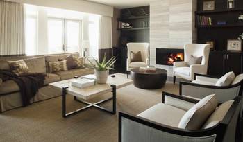 Elegant Living Room with Fireplace: Blending Comfort and Functionality in Neutral Tones