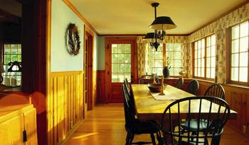 Traditional American Country Interior with Wooden Paneling and Natural Lighting