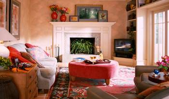 Cozy Classics: Country House Living Room with White Fireplace and Vibrant Accent Elements