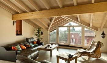 Interior design of attic in country house.