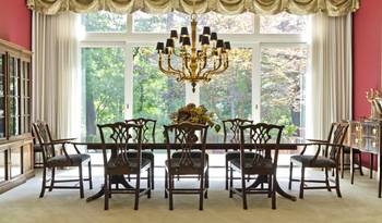 Dining room interior in private house in empire style.