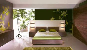 Biophilic Minimalism: Green Harmony and Wooden Accents in a Contemporary Bedroom