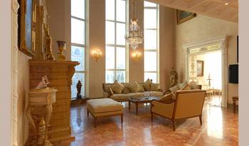 Neoclassical interior with panoramic windows and marble flooring: luxury in details