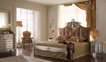 Design of bedroom in private house in empire style.