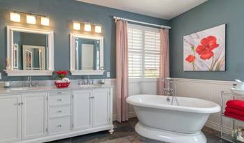 Elegant Blue-Gray Bathroom with Bold Red Accents