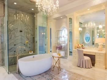 Luxurious marble bathroom with classic elements and modern ergonomics