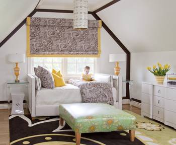 Harmonious attic children's bedroom with contrasting beams and vibrant accents