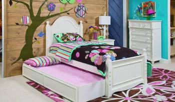 Bright children's bedroom with natural wood paneling and functional solutions